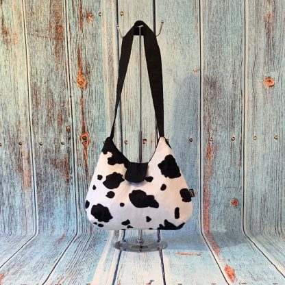 Hobo Style Handbag in Cow Print Faux Fur with Black Cotton Lining