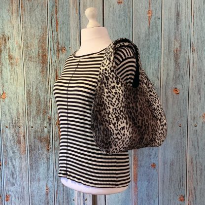 Large Hobo Round handbag in Snow Leopard Print Faux Fur