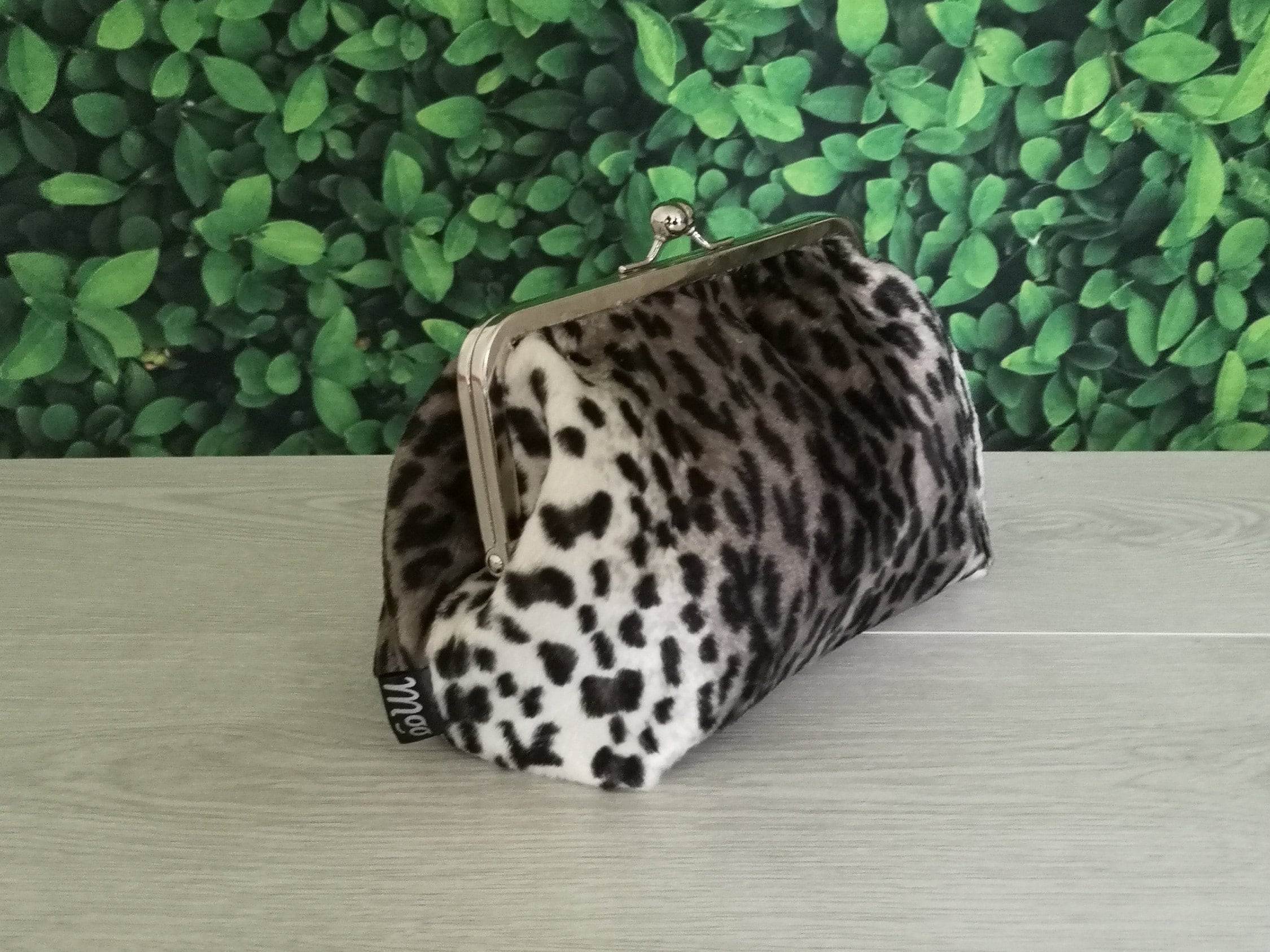 Clutch Purse in Soft Snow Leopard Print Faux Fur with Silver Metal Frame |  Creative Moo