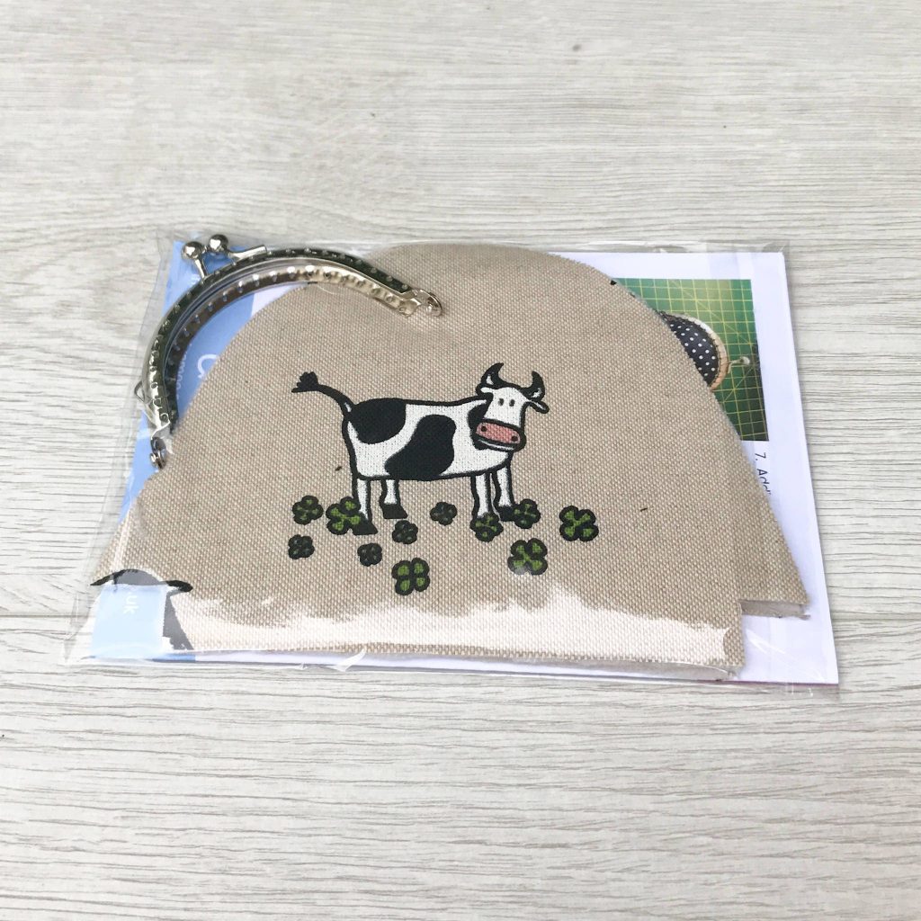 coin-purse-sewing-kit-in-cow-print-fabric-with-silver-frame-ideal