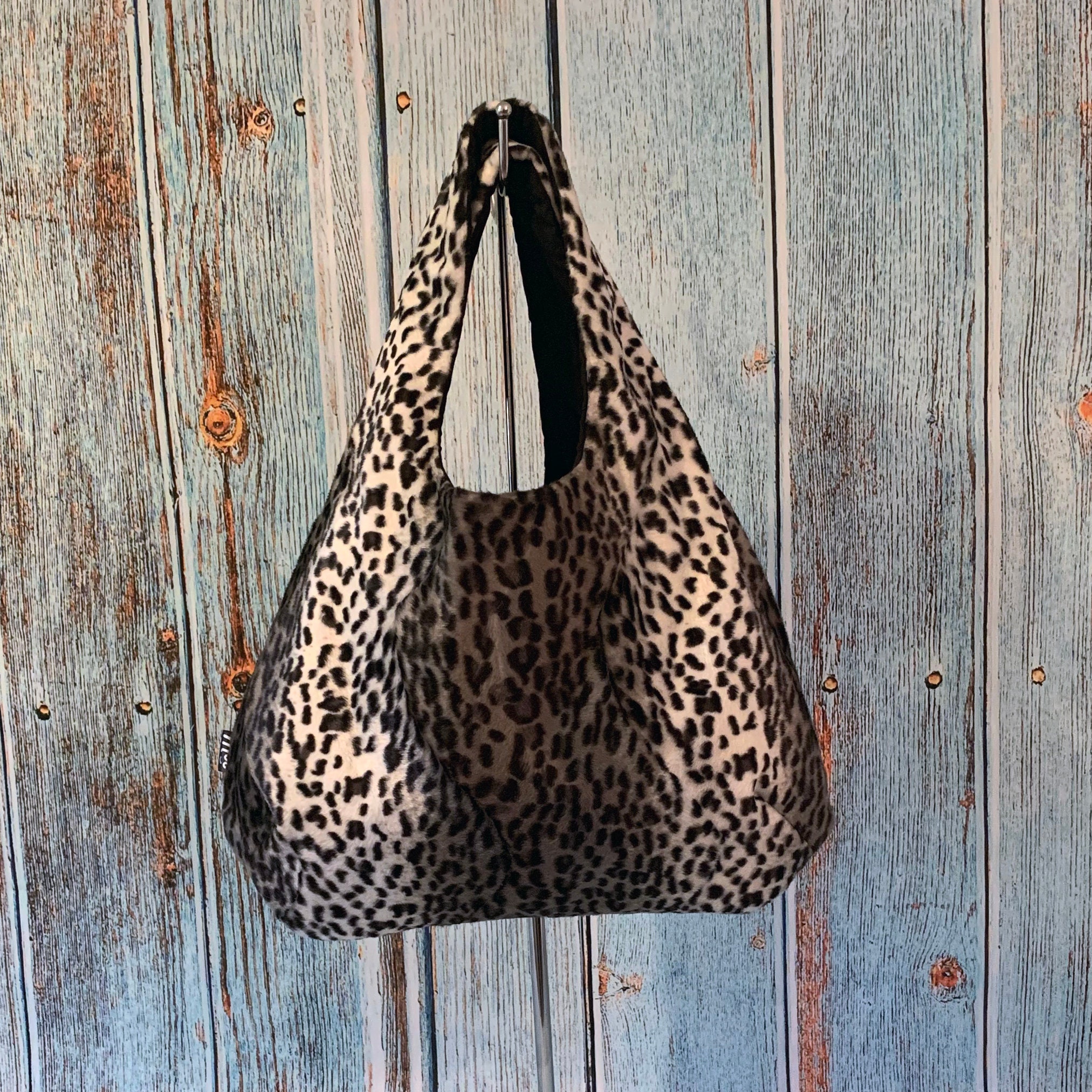 Hobo Round handbag in Snow Leopard Print Faux Fur | Creative Moo