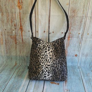 Over the shoulder zipper handbag in Snow Leopard Print Faux Fur